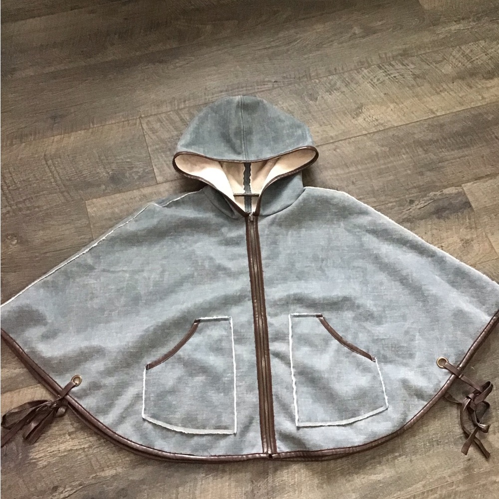 Hooded reversible cape.denim look/faux fur.brown faux leather trim. Zip up.EUC